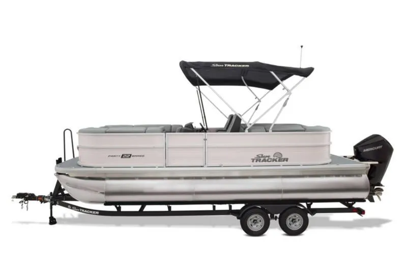 Slide: The Image of 2026 Sun Tracker Party Barge 22 DLX pontoon boat on trailer, side view. - 7