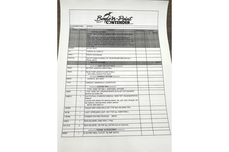 Slide: The Image of 2026 Contender 26 Bay boat interior with dual seats and modern console. - 1