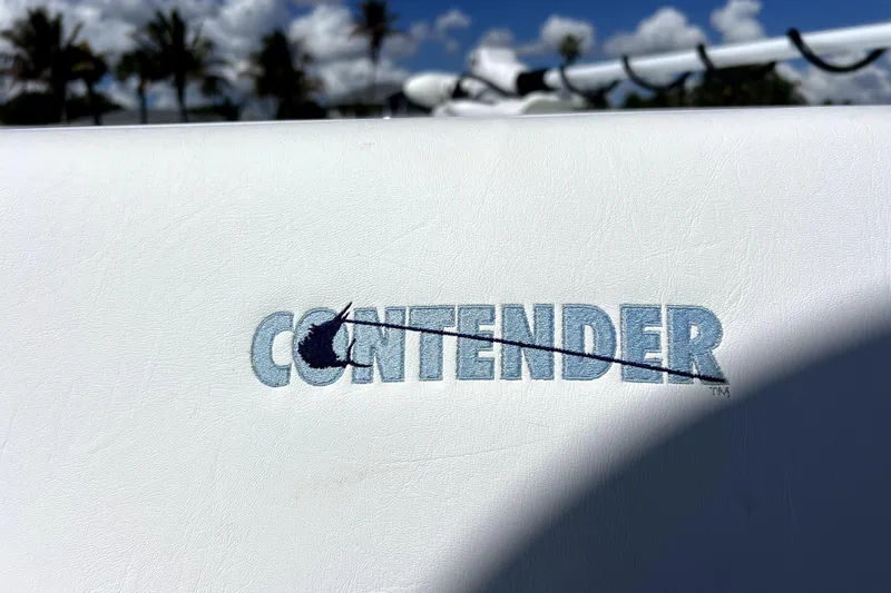 Slide: The Image of 2026 Contender 26 Bay logo on white surface with palm trees in background. - 17