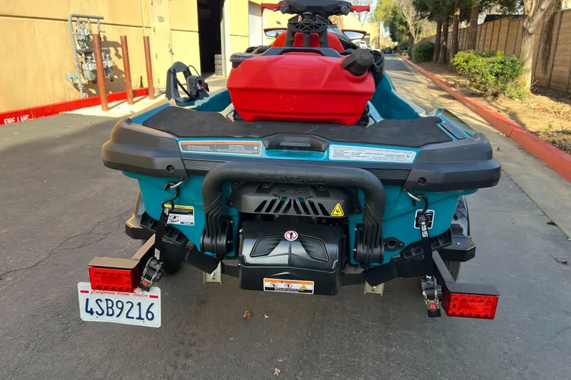Slide: The Image of 2018 Sea-Doo Wake Pro 230 on trailer, rear view, parked outdoors. - 6
