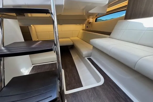 Slide: The Image of Interior of 2021 Regal 36 Grande Coupe with modern seating and sleek design. - 15