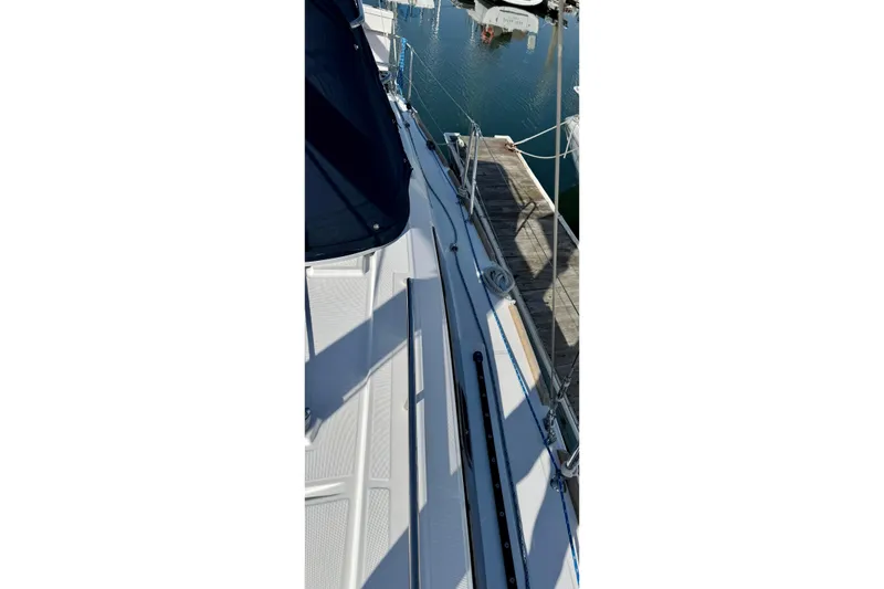 Slide: The Image of 2018 Beneteau Oceanis 35.1 sailboat deck view at marina. - 48