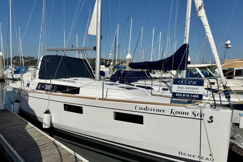 Slide: The Image of 2018 Beneteau Oceanis 35.1 sailboat docked at marina, featuring sleek design and modern amenities. - 67