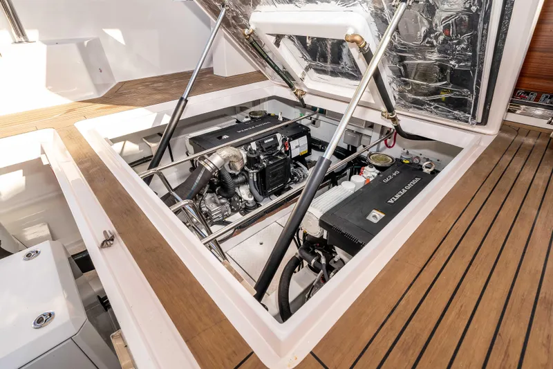 Slide: The Image of Engine compartment of 2021 Outback Yachts 50, showcasing detailed mechanical components. - 20