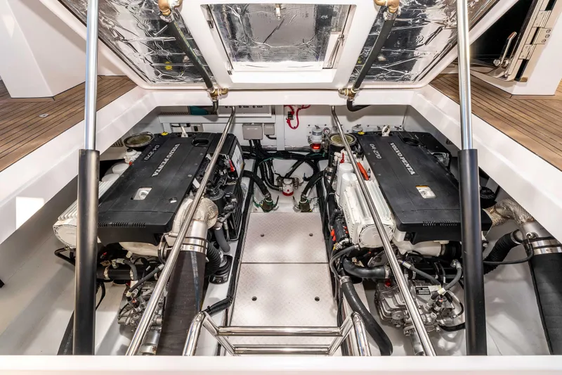 Slide: The Image of Engine room of 2021 Outback Yachts 50, featuring dual Volvo Penta engines. - 21