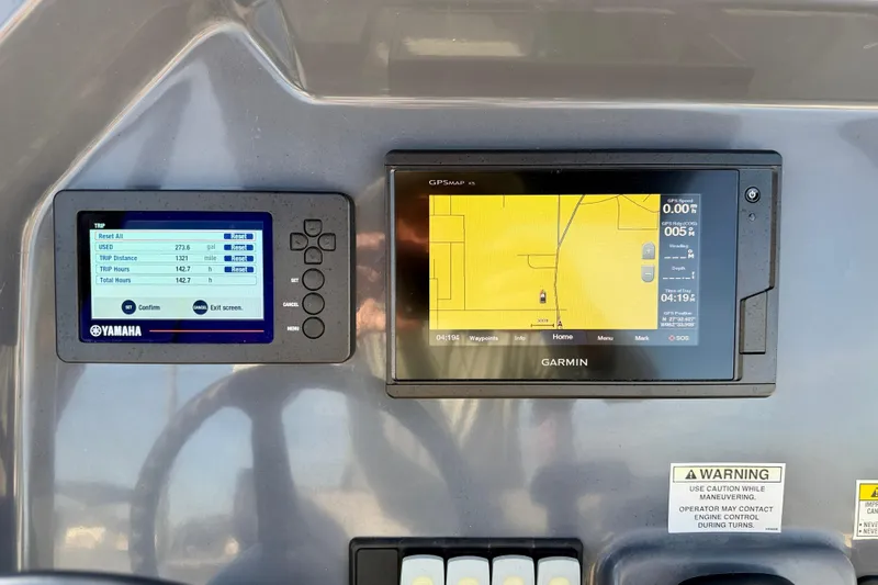 Slide: The Image of Dashboard of 2019 Zodiac Open 5.5 with Yamaha and Garmin displays. - 10