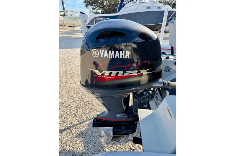 Slide: The Image of 2019 Zodiac Open 5.5 with Yamaha VMAX outboard motor in a boatyard. - 22