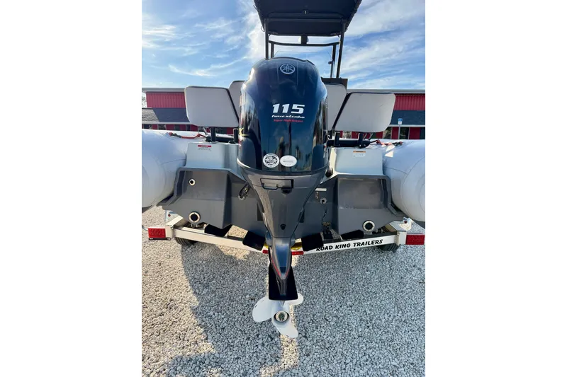 Slide: The Image of 2019 Zodiac Open 5.5 boat with Yamaha 115 engine on trailer. - 23