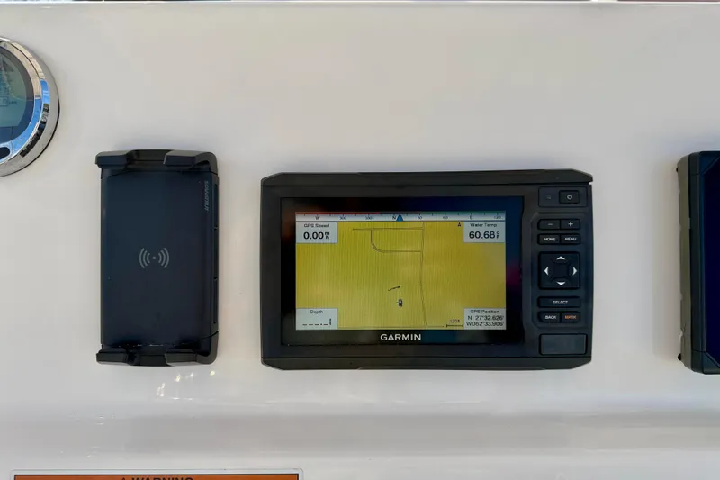 Slide: The Image of Garmin GPS display on 2021 Cobia 237 Center Console boat dashboard. - 14