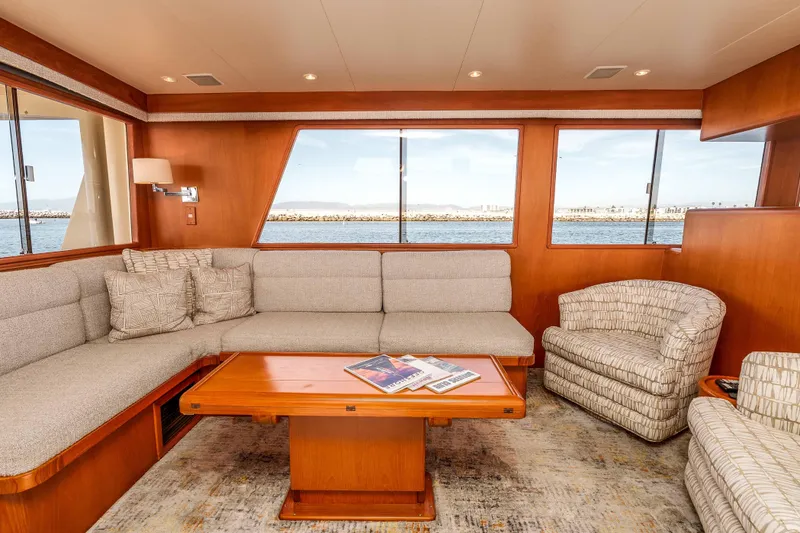 Slide: The Image of Luxurious interior of 2000 Offshore Yachts Flushdeck with plush seating and ocean view. - 12