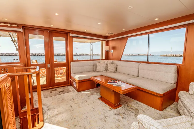 Slide: The Image of Luxurious interior of 2000 Offshore Yachts Flushdeck with ocean view and elegant furnishings. - 13