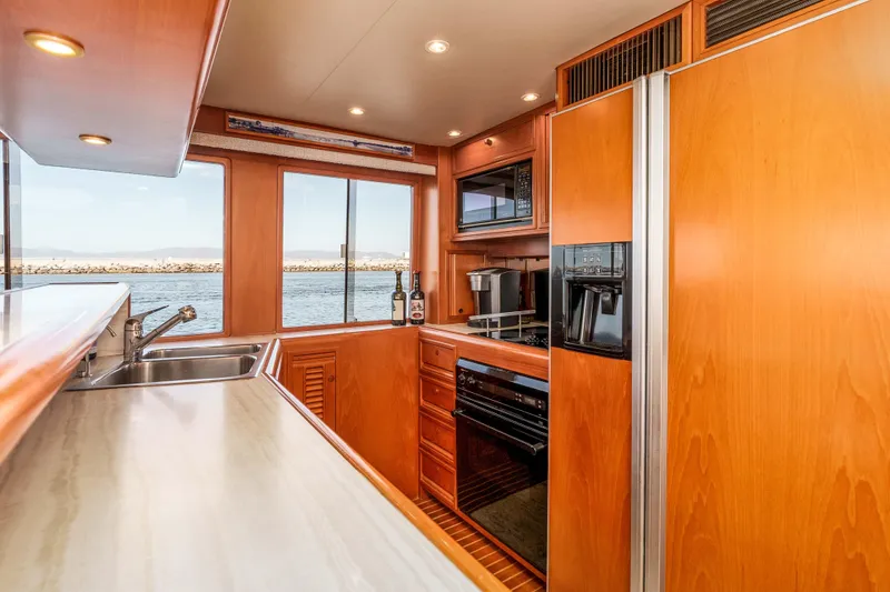 Slide: The Image of Luxurious kitchen interior of 2000 Offshore Yachts Flushdeck with ocean view. - 15