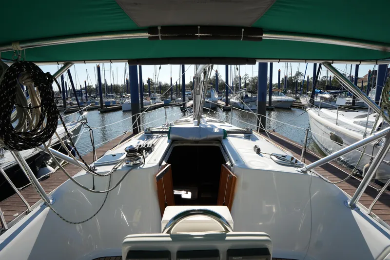 Slide: The Image of 2007 Beneteau 373 sailboat docked at marina, view from cockpit. - 12