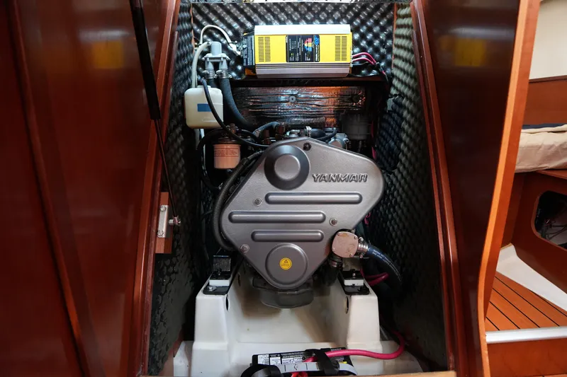 Slide: The Image of Engine compartment of a 2007 Beneteau 373 sailboat featuring a Yanmar engine. - 28