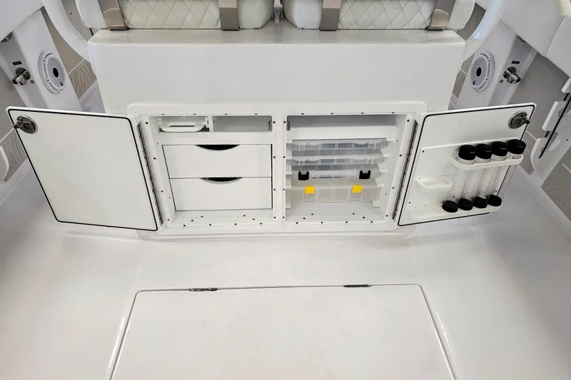 Slide: The Image of Jupiter 26 boat storage compartments with drawers and tackle boxes, 2026 model. - 15