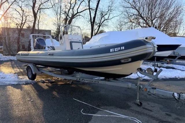 The Image of 2019 Highfield Patrol 660 boat on trailer in snowy outdoor setting. - 0