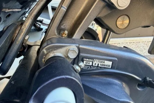 Slide: The Image of Close-up of Yamaha F175XA engine on 2019 Highfield 640 Deluxe boat. - 14