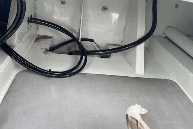 Slide: The Image of Interior view of 2019 Highfield 640 Deluxe boat showing wiring and structural details. - 21