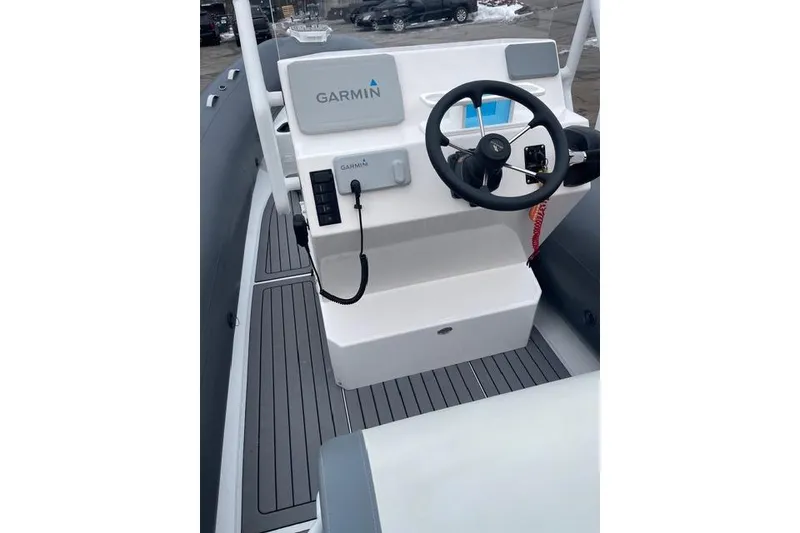 Slide: The Image of 2019 Highfield 640 Deluxe boat console with Garmin navigation system. - 24