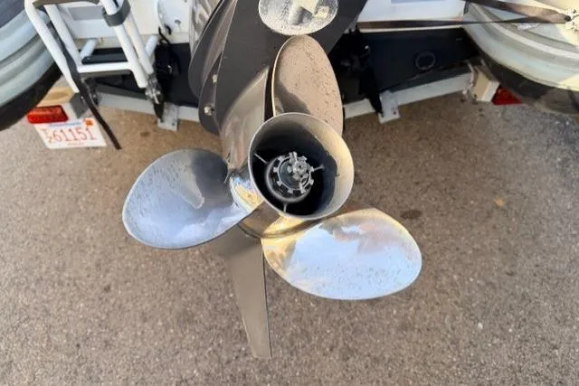 Slide: The Image of 2019 Highfield 640 Deluxe boat propeller on trailer, close-up view. - 31