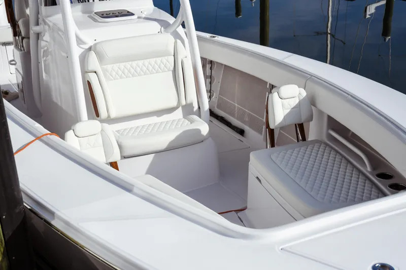 Slide: The Image of Luxurious interior of 2026 Jupiter 30 boat with white seating and sleek design. - 6