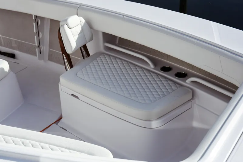 Slide: The Image of Luxurious seating area on a 2026 Jupiter 30 boat with quilted upholstery. - 7