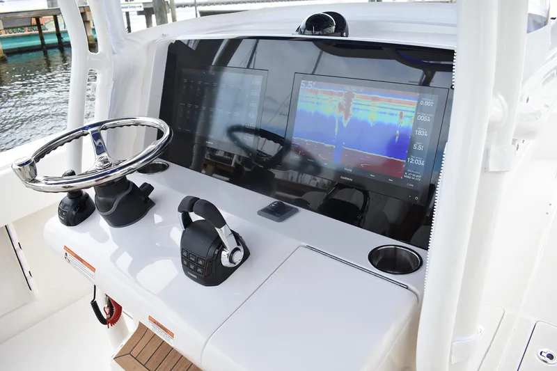 Slide: The Image of Manufacturer Provided Image: Modern boat dashboard with advanced controls and display, Jupiter 34, 2026 model. - 7
