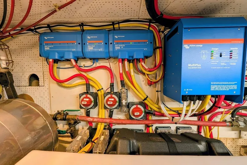 Slide: The Image of Electrical system of a 1987 DeFever Trawler with Victron Energy components and wiring. - 45