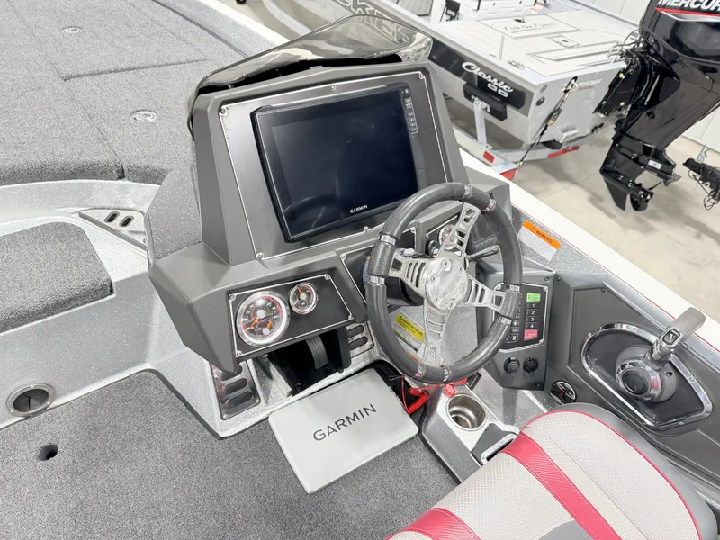 Slide: The Image of Interior of a 2019 Ranger Z520L boat with Garmin display. - 10