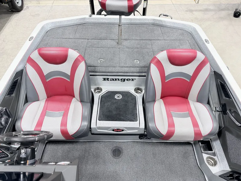 Slide: The Image of Interior of a 2019 Ranger Z520L boat with red and gray seats. - 14
