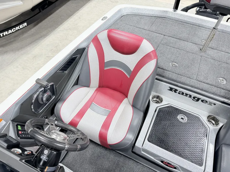 Slide: The Image of Interior of a 2019 Ranger Z520L boat with red seat. - 19