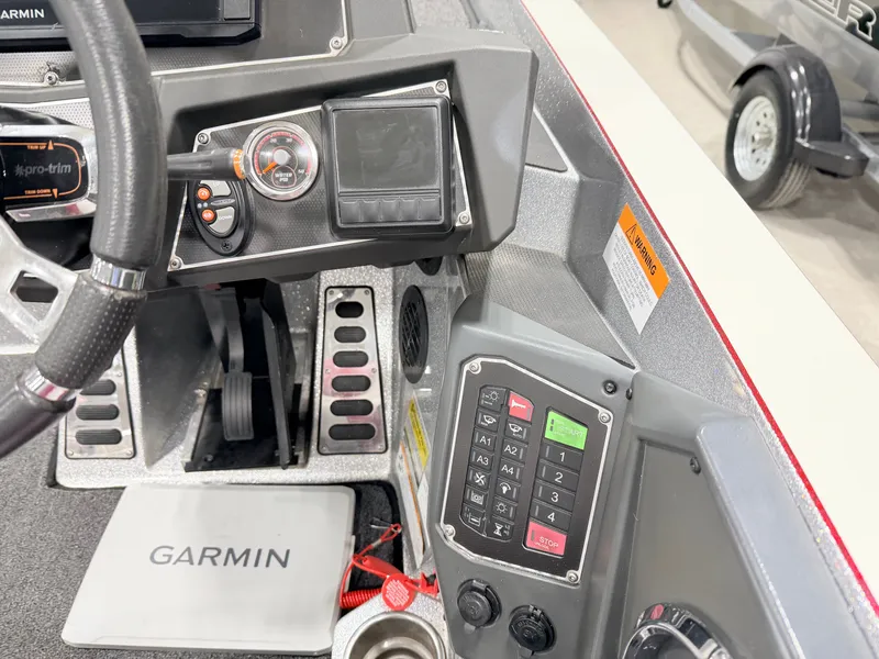 Slide: The Image of Dashboard of a 2019 Ranger Z520L boat with Garmin device. - 25