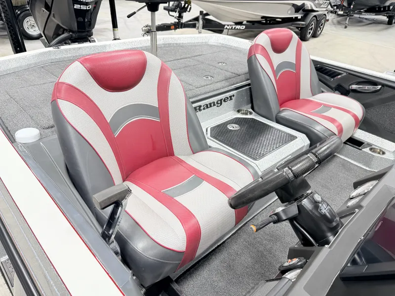 Slide: The Image of 2019 Ranger Z520L boat with red and gray seats. - 28