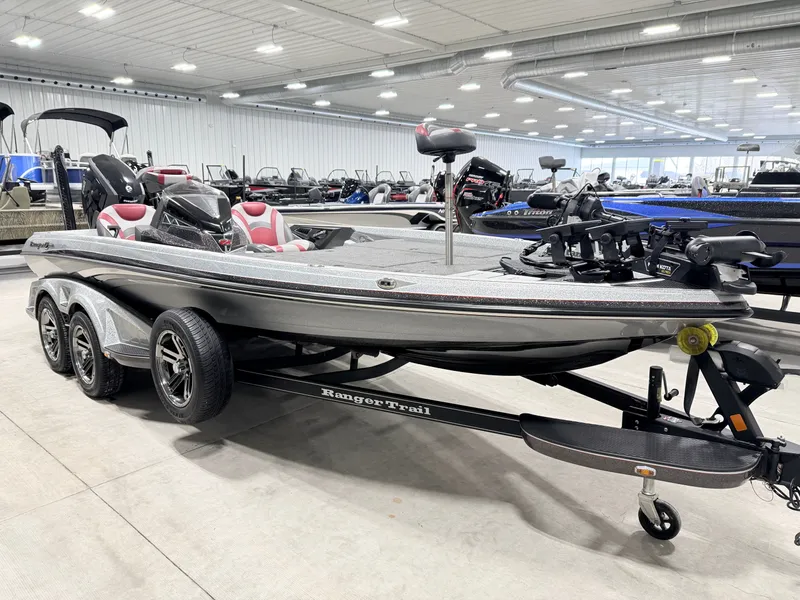 Slide: The Image of 2019 Ranger Z520L boat displayed in a showroom. - 36