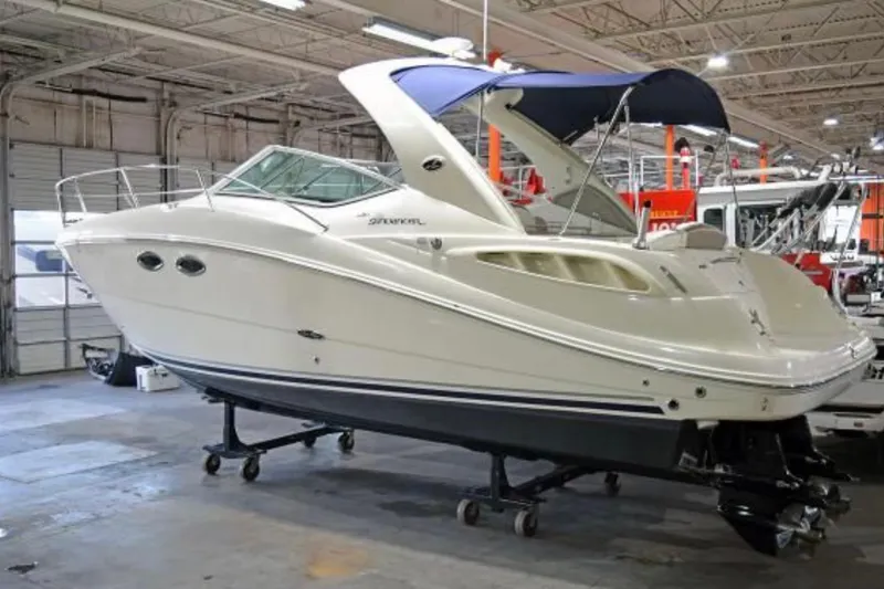 The Image of 2006 Sea Ray 290 Sundancer boat in indoor storage facility. - 0