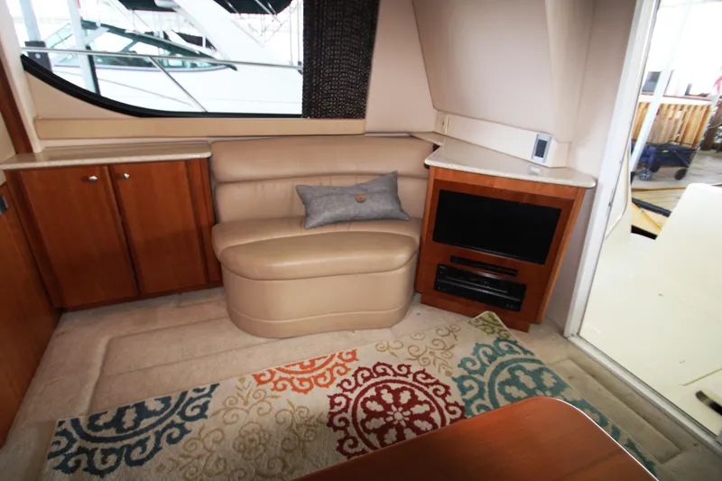 Slide: The Image of Interior of a 2003 Meridian 381 Sedan yacht with sofa and rug. - 12
