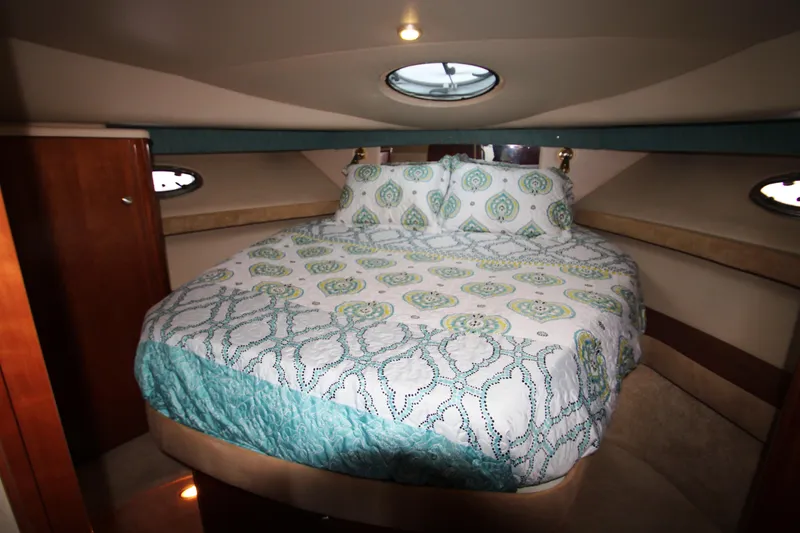 Slide: The Image of Interior of a 2003 Meridian 381 Sedan yacht with cozy bedroom. - 22