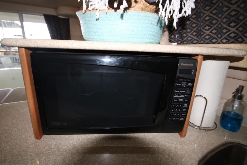 Slide: The Image of Panasonic microwave in Meridian 381 Sedan yacht kitchen, year 2003. - 26