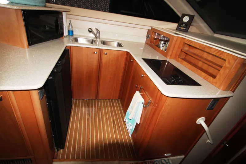 Slide: The Image of Kitchen area of the 2003 Meridian 381 Sedan yacht. - 28