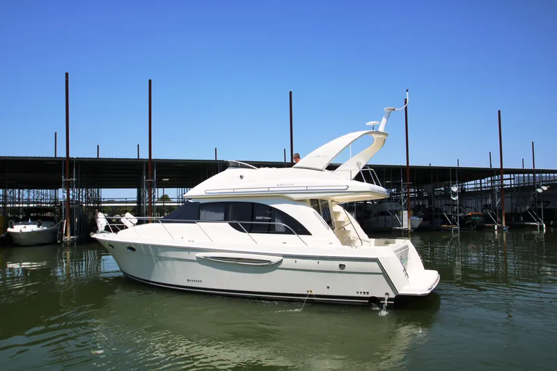 Slide: The Image of 2003 Meridian 381 Sedan yacht docked in harbor. - 3