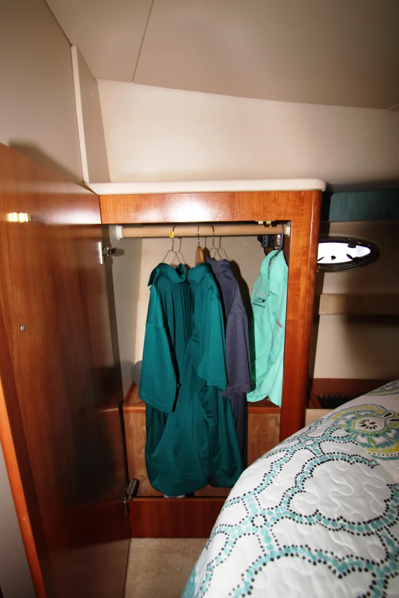 Slide: The Image of Wardrobe in a 2003 Meridian 381 Sedan yacht. - 34