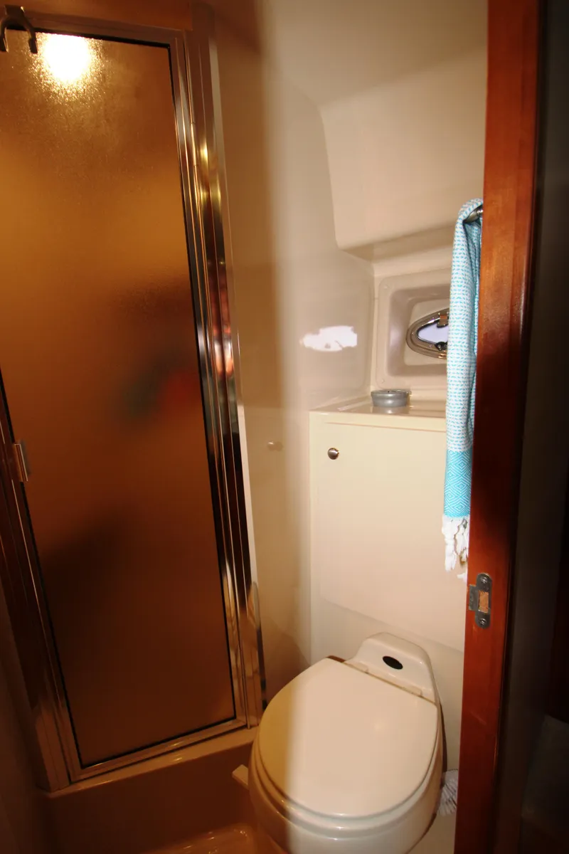 Slide: The Image of Bathroom in 2003 Meridian 381 Sedan with shower and toilet. - 37