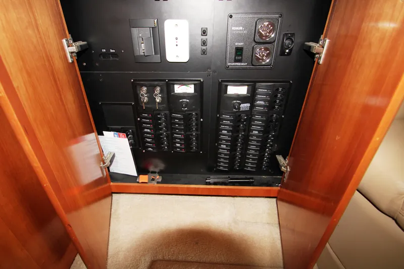 Slide: The Image of Electrical control panel in a 2003 Meridian 381 Sedan yacht. - 47