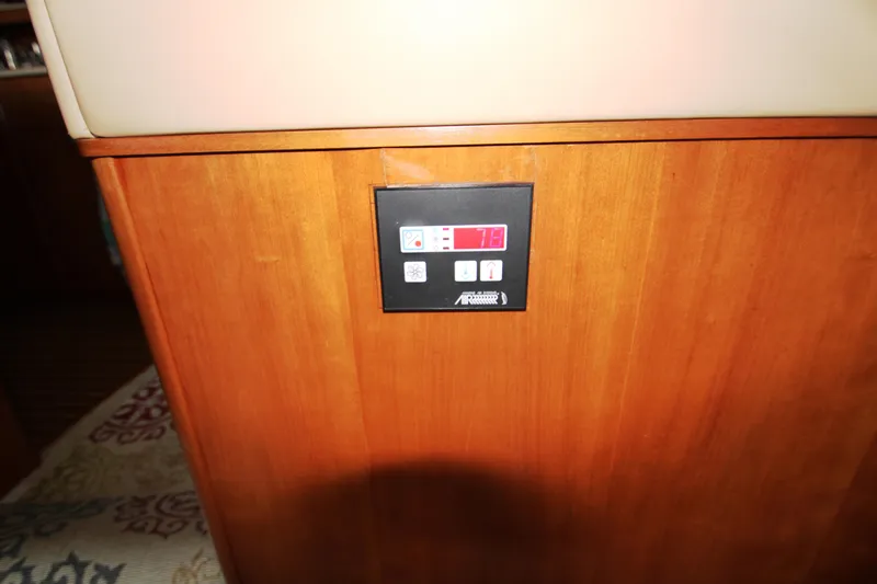 Slide: The Image of Control panel in a 2003 Meridian 381 Sedan yacht. - 48