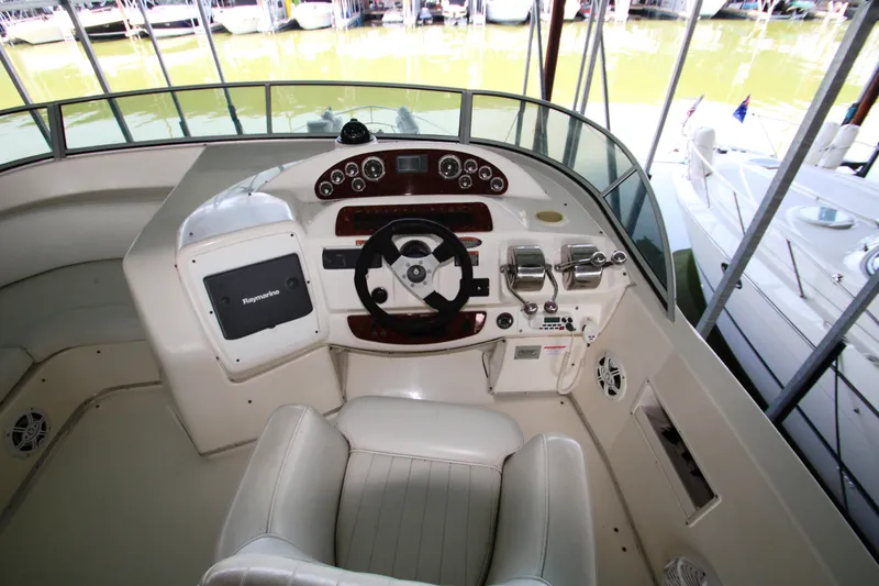 Slide: The Image of Helm of a 2003 Meridian 381 Sedan yacht in marina. - 49