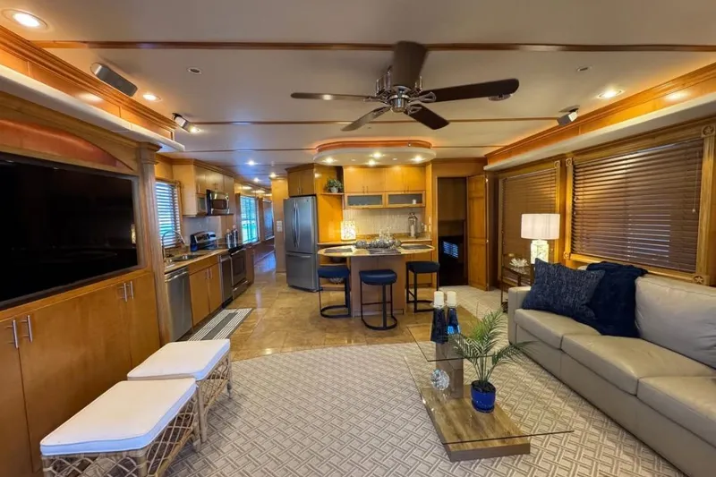 Slide: The Image of Luxurious interior of 2009 Starlite 18 x 70 houseboat with modern kitchen and cozy living area. - 5