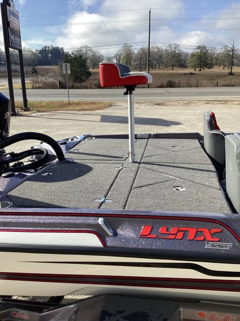 Slide: The Image of 2026 Bass Cat Puma STS boat on trailer, side view. - 10