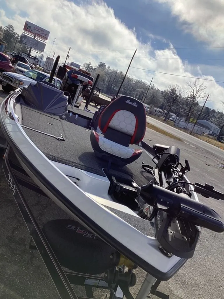 Slide: The Image of 2026 Bass Cat Puma STS on trailer under blue sky. - 14