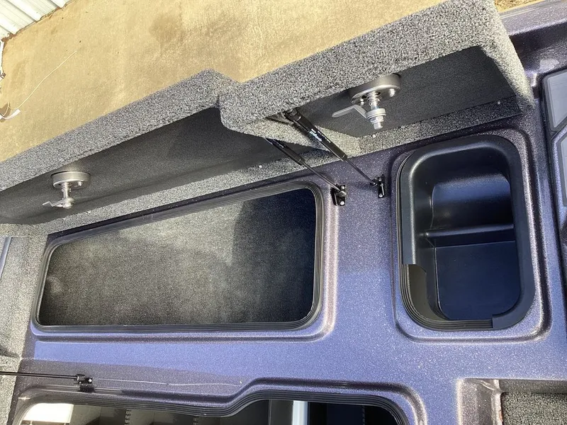 Slide: The Image of 2026 Bass Cat Puma STS boat with shiny finish and American flag. - 18