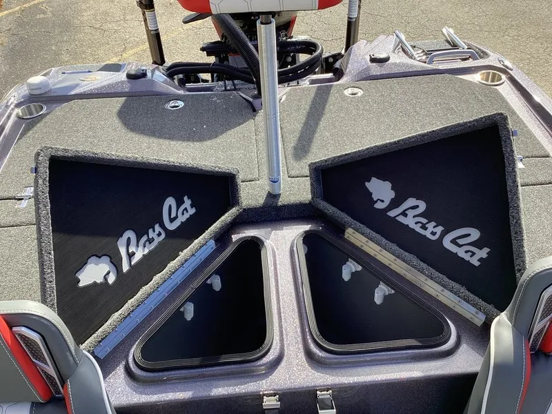 Slide: The Image of 2026 Bass Cat Puma STS boat deck with storage compartment. - 22